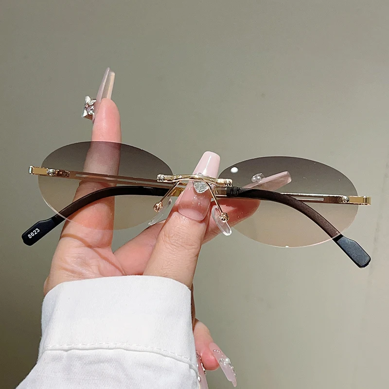 Sunglasses Uv400 - نظارات شمسية بيضاوية بدون إطار للنساء،